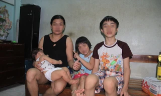 Chị T.H.M quyết định triệt sản khi một nách ba con làm kinh tế gia đình kiệt quệ. Ảnh: Thanh Trần 