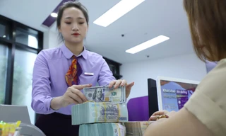 Việc Việt Nam bị xếp hạng tín nhiệm thấp sẽ ảnh hưởng đến vay nợ quốc tế của nhiều doanh nghiệp và cả Chính phủ. Ảnh: Như Ý