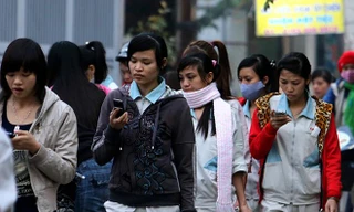 Người dùng di động tại Việt Nam. Ảnh: Như Ý 