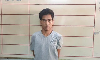 Ðối tượng Lương Tuấn Bửu bị bắt. Ảnh: Văn Minh