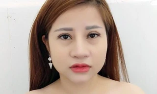 Quách Thị Thắm tại cơ quan công an.