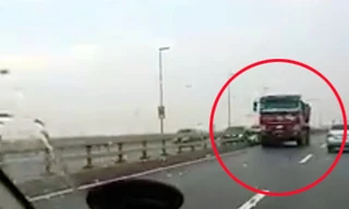 Tước GPLX tài xế xe tải đi ngược chiều trên cầu Nhật Tân