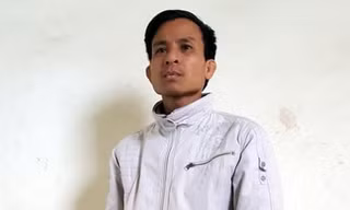 Nguyễn Văn Tám tại cơ quan điều tra.