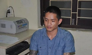 Hoàng Văn Trưởng tại cơ quan công an trong một vụ án trước đó.