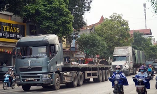 Né trạm thu phí, hung thần container 'rồng rắn' vào quốc lộ