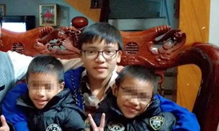 Gia đình đang tìm kiếm tung tích cháu Tình (ở giữa) mất tích hai ngày nay