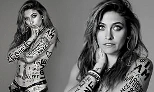 Con gái Michael Jackson táo bạo bán nude, chi chít hình vẽ trên cơ thể