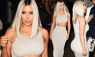Kim Kardashian diện đầm ôm cắt xẻ khoe dáng đồng hồ cát