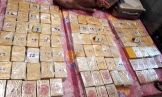 Kiểm tra căn hộ của hai người nước ngoài, phát hiện 184 bánh heroin