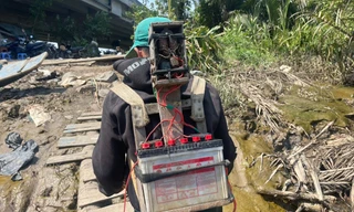 Cảnh sát truy tìm người đánh bắt thủy sản trên sông Đồng Nai bằng thuốc trừ sâu 