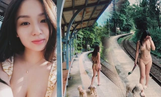 Ca sĩ gây tranh cãi vì mặc bikini bé xíu dắt chó đi dạo ở nhà ga xe lửa