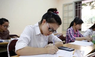 Thí sinh làm bài thi đại học 2014. Ảnh: Hồng Vĩnh