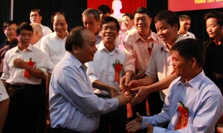 Phó Thủ tướng Nguyễn Xuân Phúc với các đại biểu tại Hội nghị. Ảnh: T.D