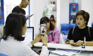 Vì sao có chứng minh thư vẫn phải nộp ảnh chân dung cho nhà mạng?