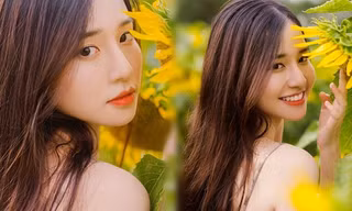 Nụ cười tỏa nắng bên hoa của nữ sinh trường đại học FPT