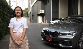 Natthanan Sanunrat chụp ảnh bên chiếc xe BMW do chính cô bé mua.