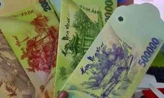 Việc in ấn, mua bán bao lì xì hình tiền Việt Là hành vi vi phạm. Ảnh: PV.