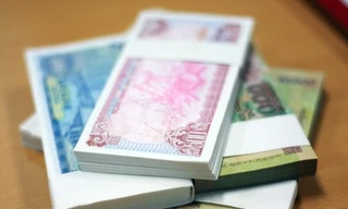 Tiền lẻ mới in mệnh giá từ 10.000 đồng trở xuống không được đưa vào lưu thông dịp Tết. Ảnh: Nhật Minh.