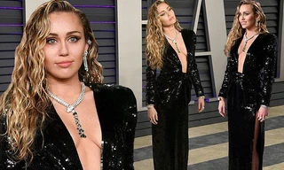 Miley Cyrus diện đầm xẻ sâu hờ hững cùng chồng dự tiệc Oscar