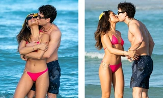 Sao truyền hình Anh hôn đắm đuối bạn gái người mẫu ‘bốc lửa’ trên bãi biển