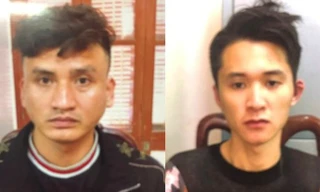 Hải và Hiệp tại cơ quan điều tra. Ảnh: H.T.