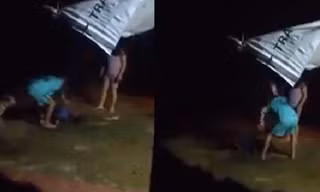Người đàn ông bị vợ và con trói, đánh gây bức xúc. Ảnh cắt từ clip