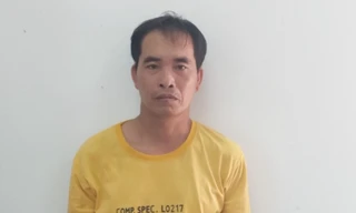 Hoàng Văn Hiệp tại cơ quan công an.