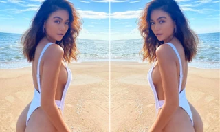 Á hậu Mâu Thuỷ mặc áo tắm cắt xẻ táo bạo khoe vòng ba 'bỏng rẫy'