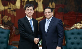 Thủ tướng Phạm Minh Chính tiếp Bộ trưởng Bộ Công tác về quân nhân xuất ngũ Trung Quốc Bùi Kim Giai. Ảnh: VGP