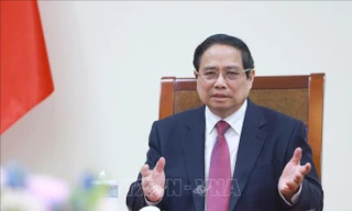 Thủ tướng Phạm Minh Chính trong cuộc điện đàm với Thủ tướng New Zealand ngày 10/4. (Ảnh: TTXVN)