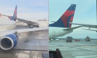  Vụ va chạm giữa hai máy bay của Japan Airlines và Delta Airlines, khiến phần cánh và đuôi máy bay bị mắc kẹt vào nhauẢnh: AP