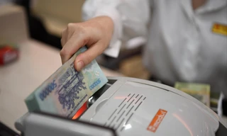 Lãi suất tiết kiệm giảm nhanh nhưng lãi suất cho vay giảm không kịpẢnh: Như Ý