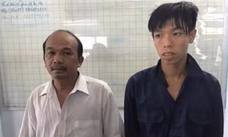 Hai nghi can tại cơ quan điều tra. Ảnh: Việt Văn.