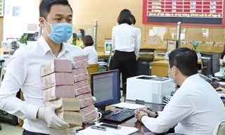 Đua huy động lãi suất cao, ngân hàng bắt đầu ngấm đòn