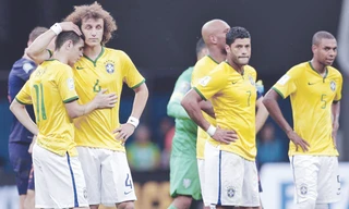 Brasil kết thúc trong thất vọng, Scolari vẫn chưa từ chức. Ảnh: AP/Getty Images