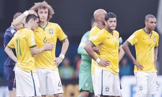 Brasil kết thúc trong thất vọng, Scolari vẫn chưa từ chức. Ảnh: AP/Getty Images