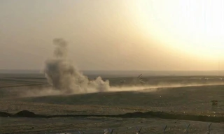 Chùm ảnh: Iraq chìm trong khói lửa, bom đạn