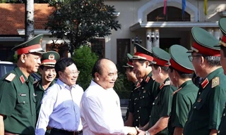 Chủ tịch nước Nguyễn Xuân Phúc với các đại biểu tham dự hội thảo. (Ảnh: Thống Nhất/TTXVN) 