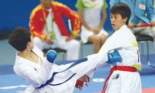 Trận đấu giữa Nguyệt Ánh và Li Hong. Ảnh: Tuân Bạc