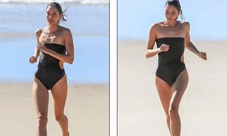 Tình cũ của Zac Efron lẻ loi đi biển