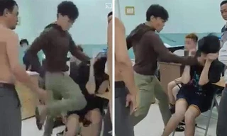 Bảo vệ dân phố "ra đòn" vô cùng tàn nhẫn với hai thiếu niên. Ảnh cắt từ clip