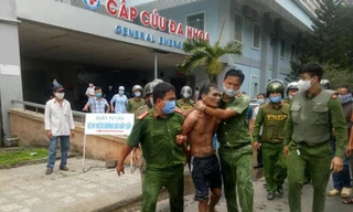 Lực lượng Cảnh sát 113 Công an tỉnh Quảng Ngãi khống chế đối tượng Đinh Văn Máy- ảnh (Công an cung cấp)