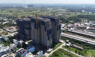 Khó giảm giá nhà ở vì tiền sử dụng đất cao