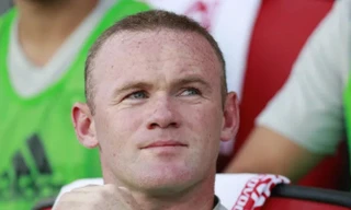 Wayne Rooney trên đường trở lại nước Anh.