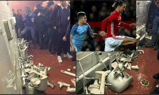 CĐV Man City tức giận đập phá nhà vệ sinh của sân Old Trafford.
