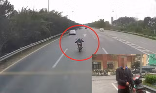 Nam thanh niên 'diễn xiếc' nằm trên xe máy ở Đại lộ Thăng Long khai gì?