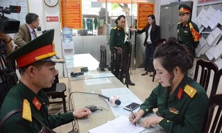 Đối tượng Đào Thị Uyên tại cơ quan chức năng. Ảnh: QĐND