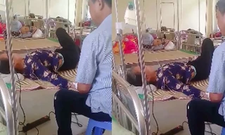 Phẫn nộ clip chồng tát bốp mặt vợ đang nằm trên giường bệnh rồi quát lớn