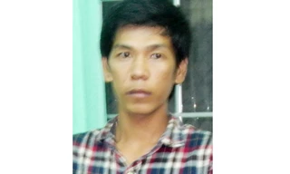 Sang bị bắt sau 3 tuần đâm người phụ nữ vỗ đầu mình. Ảnh: Yến Phương