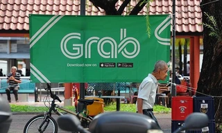 Grab là hãng cung cấp dịch vụ đi chung xe lớn nhất Đông Nam Á. Ảnh: Business Times
